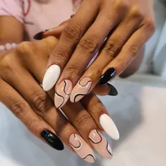 And here is the finished result. I recreated the abstract black and white swirl design on long almond extensions, and I love how they turned out.