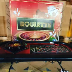 Bring the excitement of Vegas to your party. We provide professional-quality casino game tables, like this complete Roulette setup, to give your guests an authentic and entertaining experience.