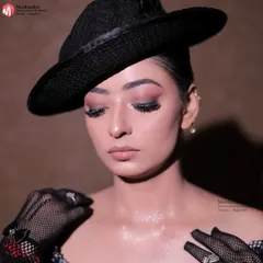 This vintage-inspired look with a classic hat and soft smokey eyes is perfect for themed parties or editorial shoots. You'll learn to create looks from different eras.