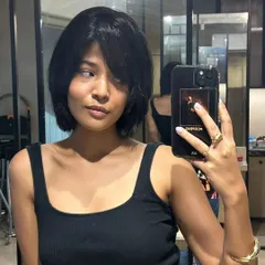 Another look at this chic choppy bob. It's a versatile cut that can be styled in many ways, showcasing its great texture and shape.