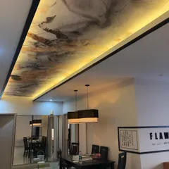 A different angle of the backlit ceiling mural, showing how it transforms the dining area. My work ensures the wallpaper is perfectly smooth and the lighting is evenly distributed.