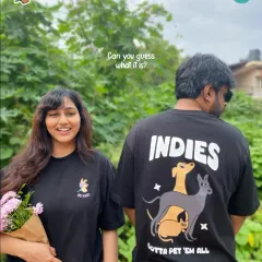 Our cause-driven t-shirts are designed to be conversation starters. This photo shows the front and back of our popular designs, perfect for any dog lover who wants to proudly show their support for Indian dogs.