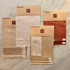 A behind-the-scenes look at fabric swatch selections for a client. I curate options for curtains, sheers, headboards, and upholstery, ensuring the textures and tones come together perfectly to bring a vision to life.
