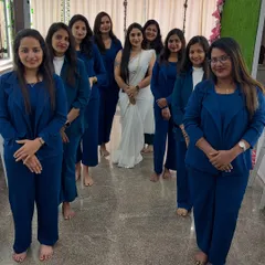 A full class of certified beauticians and hair stylists. I make sure every student gets personal attention, and seeing them all succeed together is my greatest reward.