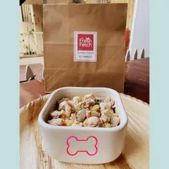 Your dog's fresh meal, ready for delivery. The Bow Chicky Bow Chow is one of my most popular dishes, packed in a convenient container and delivered in our signature Fresh Fetch bag.
