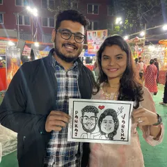 Capturing smiles at the Lalbaug Food Festival in Mumbai. Live caricatures are a fantastic addition to any festival or public event, giving people a fun, artistic souvenir to take home.