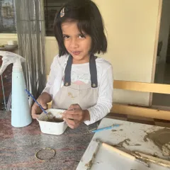 My daughter, my inspiration. Seeing her mix clay and paint with such curiosity reminds me of the pure, simple joy of creating.