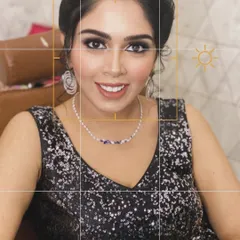 This is our signature party-ready look, perfect for an evening gala or a cocktail event. We created a captivating smokey eye, balanced with a sophisticated nude lip and a luminous skin finish. The result is pure glamour that ensures you are the center of attention.