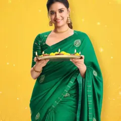 It was an absolute joy draping the gorgeous Keerthy Suresh for this festive shoot. I ensured the green silk saree had a flawless fall, complementing her grace and creating a vibrant, celebratory look for the camera.