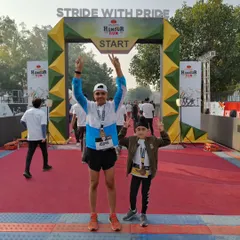 "Stride with Pride." Celebrating at the finish line of the Honour Run with one of my young athletes. We start and finish strong together.