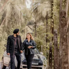 A candid shot of the couple walking hand-in-hand, with their convertible car in the background. This image feels like a still from a romantic road trip movie.