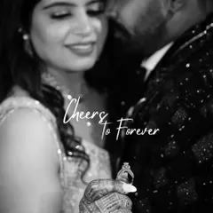 A timeless black and white shot focusing on the engagement ring. The bride's hand is in the foreground, symbolizing the promise of a future together.