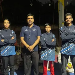 Standing with my national-level athletes before their competition. I am proud to coach such a talented and hardworking squad.