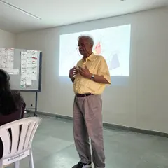 Leading a design charrette at CARE School of Architecture. These intensive workshops challenge students to think quickly and collaboratively, generating creative solutions for complex urban problems.