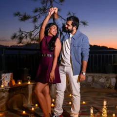 A romantic dance under the stars, on a patio decorated with candles and rose petals. A perfect fairytale moment.