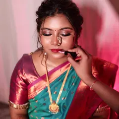 The final touch. Applying a soft lip color to complete a makeup look that is all about enhancing my bride's natural features.