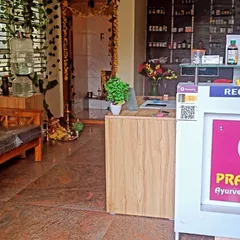 Another view of my clinic's reception area, where you can see our organized dispensary of Ayurvedic medicines in the background. I ensure a tranquil and orderly space for all my patients.