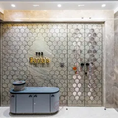 A view of the entrance with the outer security door partially open, revealing the beautiful pattern and craftsmanship. The design is a perfect blend of security, style, and soul.