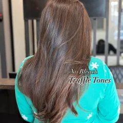 Rich, radiant, and effortless. These 'Truffle Tones' were created without any bleach. It's a subtle transformation that speaks volumes while maintaining hair integrity.