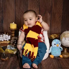 The prettiest wizard in town. This shot captures a sweet, candid moment during the themed session. These milestone photos are all about capturing your baby's adorable expressions and budding personality.
