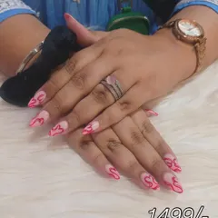 Bringing the heat with this flame design. I hand-painted hot pink flames licking up from the cuticles on these almond-shaped nail extensions for a fiery, trendy look.