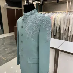 Another angle of the mint green Jodhpuri, showing its flawless cut and structure.