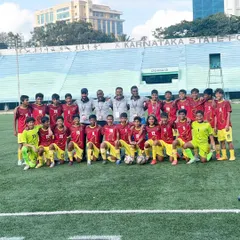A group photo with the victorious Karnataka sub-junior football team. Being integrated with the team on the field allows me to provide consistent and effective sports medical support.