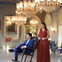 A posed portrait in the grand hall, showcasing the ornate details of the location. I help couples with posing that feels stately and natural within these magnificent spaces.