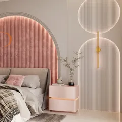 A modern bedroom design featuring a striking arched headboard with pink velvet channel tufting. The space is enhanced by custom backlit wall panels and a matching bedside table, creating a soft, luxurious, and contemporary ambiance.