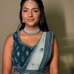 A portrait of modern elegance. The soft glam makeup, with its radiant finish, looks stunning with her diamond jewellery and contemporary lehenga.
