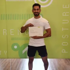 Proudly holding my Pilates certification. I believe in the process and constantly adding new skills to better serve my clients and my community.