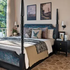 For this Panchgani villa, I designed a bedroom that feels both grand and intimate. The classic four-poster bed paired with modern styling and soft fabrics creates a perfect retreat with a view.