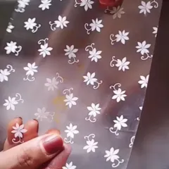 A closer look at the delicate floral pattern on my cone wrappers. It's a small detail that reflects the care I put into my craft.