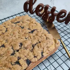 A delicious Blueberry Crumble loaf cake, with a moist cake base and a generous, crunchy crumble topping, perfect with a cup of coffee.