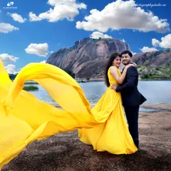 Our pre-wedding shoots are about telling your unique story. Here, we created a dramatic, cinematic scene with a flowing gown against a stunning landscape, showing how we can turn your photo session into a piece of art.