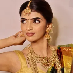 This profile shot highlights the seamless blending and contouring techniques taught in our bridal classes, ensuring the bride looks perfect from every angle.