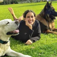 Actress Sanya Malhotra shares a relaxed moment with our Labrador, Rocky, and German Shepherd, Leo. Building genuine comfort between actors and dogs is a key part of our on-set work.
