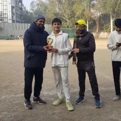 Presenting the award to Rytham for his magnificent and entertaining innings. Recognizing and rewarding great performances is key to building a player's confidence.