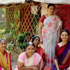 A portrait of our women-led team. For 47 years, we have celebrated the collective strength and resilience of the women who are the backbone of our studio, from our founder Lakshmi to the artisans of today.