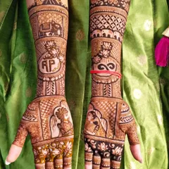 This bridal design is a complete love story. It features portraits of the couple, their initials, an infinity symbol, and other meaningful motifs that are personal to them.