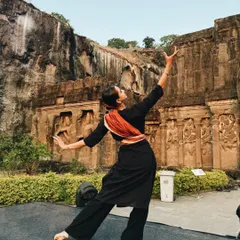 A still from my performance at the Ellora caves. This pose captures a moment of storytelling through Abhinaya, set against the backdrop of ancient rock-cut architecture.