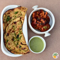 A match made in heaven: smoky Tandoori Chicken Tikka served with our special mint laccha parantha and tangy mint chutney. This is the perfect dish for a cozy winter dinner or to kickstart any celebration.