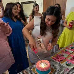 A burn away cake is perfect for a baby shower. The mom-to-be lights the top layer to reveal a surprise message or a picture of the sonogram.