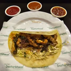 A perfect snack or starter, my Prawns Shawarma Roll. It's packed with juicy prawns cooked in a tangy sauce, fresh cabbage, and served with a variety of chutneys.