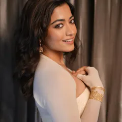 The wonderful Rashmika Mandanna glowing in my creations. She wears a pair of my bird jhumkha earrings and a wide, textured gold lace cuff, showing how these statement pieces can be styled with modern elegance.