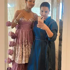 A full-length selfie with the lovely Nancy Tyagi, showcasing her complete look with the stunning pearl-adorned braid I created for her.
