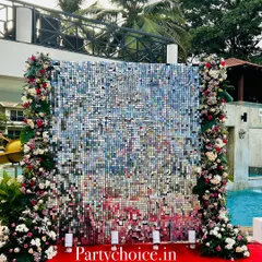 For a touch of glamour, we use elements like this shimmering silver sequin wall. It creates a dynamic photo backdrop for milestone birthdays, anniversaries, or receptions, especially for poolside or evening events.