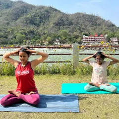 Here we are practicing Brahmari Pranayama, the humming bee breath. This calming breathing exercise is excellent for kids and adults alike, helping to improve concentration, build confidence, and soothe the mind.