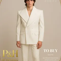 A full-length view of the white double-breasted suit, showcasing its clean lines and impeccable tailoring. The wide lapels create a powerful and classic silhouette.