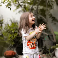 This is the kind of pure, candid laughter I live to capture. My documentary style means I'm always ready for these unposed, magical moments that truly show your child's personality.